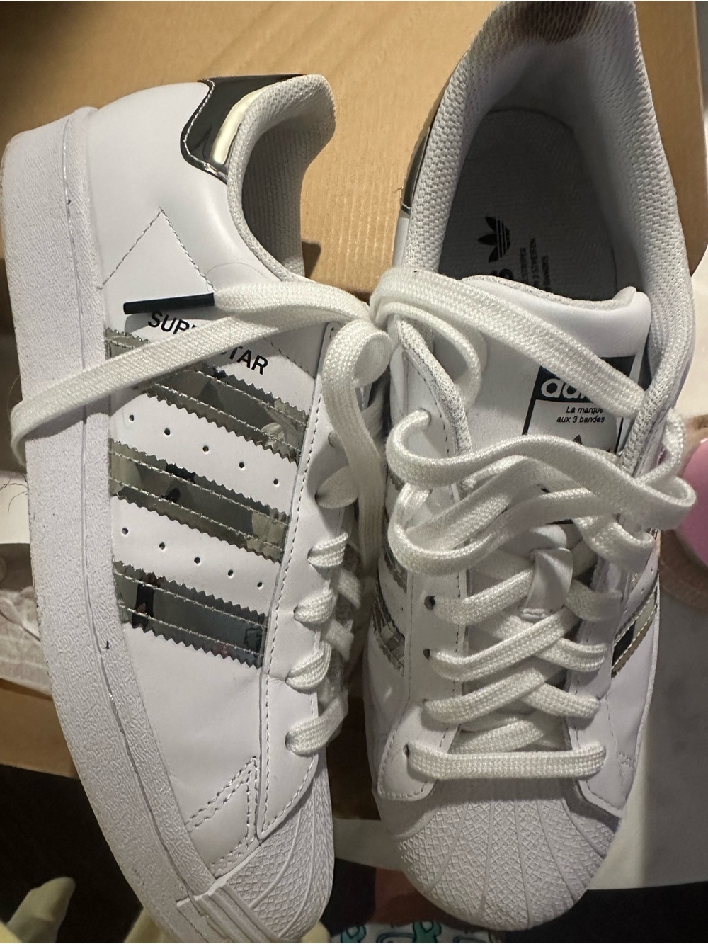 adidas Women’s Superstar Sneakers in White with Silver Stripes